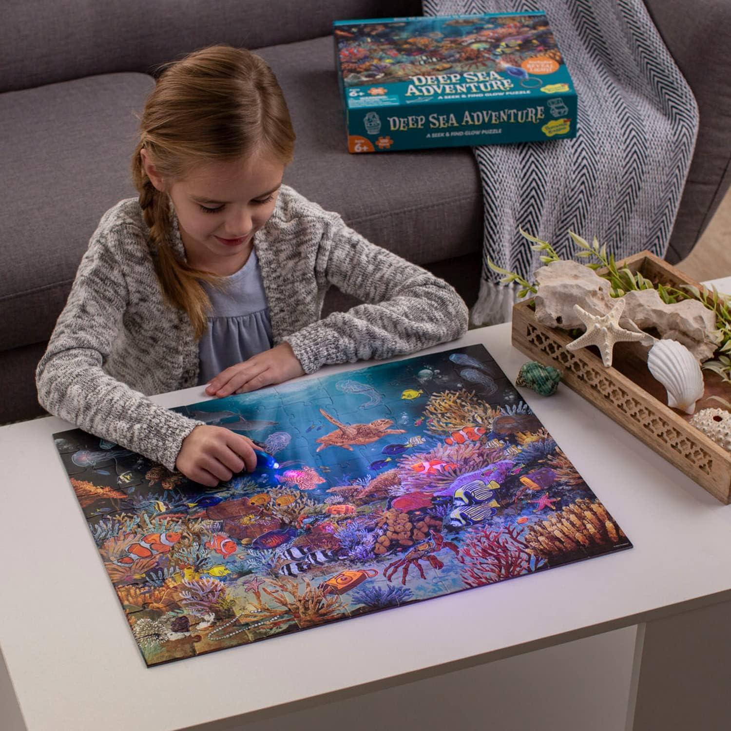 image:imagePeaceable Kingdom Deep Sea Adventure Puzzle 100Pc Seek amp Find Glow Puzzle for Kids Ages 6 amp Up Included Blacklight Reveals Hidden Items Great Family Puzzles